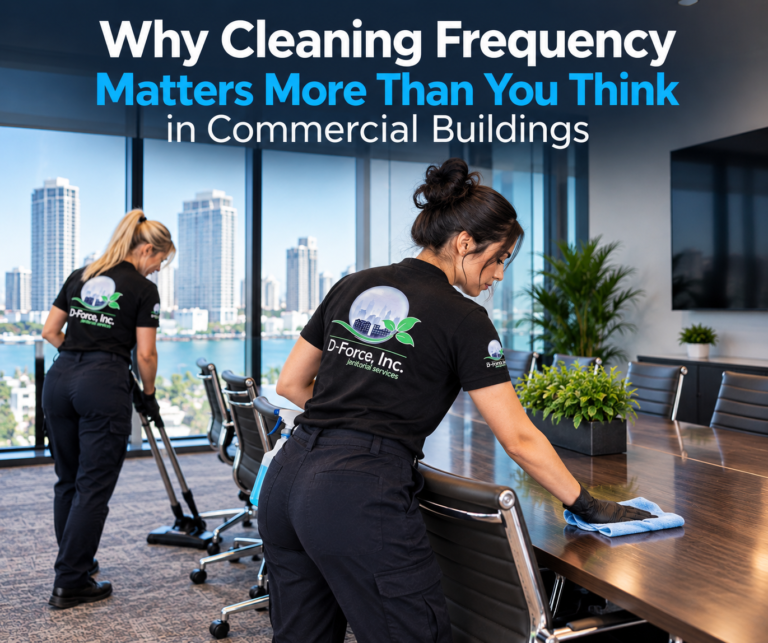 Two D-Force Janitorial cleaners maintaining a modern commercial building conference room, cleaning the meeting table and vacuuming the carpet as part of a regular cleaning schedule.